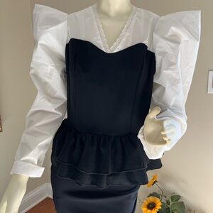 Elegant Black and White Peplum Top